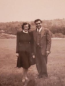 William Frank poses with his wife.jpg